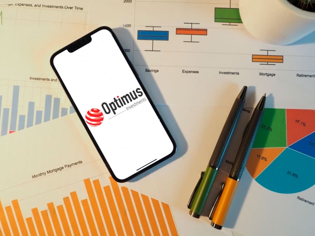 Mobile phone displaying the Optimus Investments logo above financial charts
